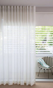 Decorate a sunroom with White Sheer Curtains
