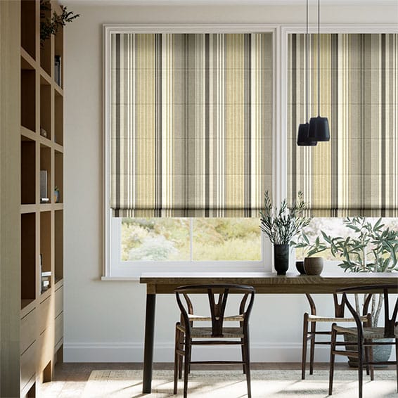 Patterned roman shades in dining room